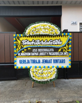 Papan Bunga Duka di Serut