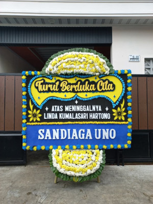 Papan Bunga Duka di Serut